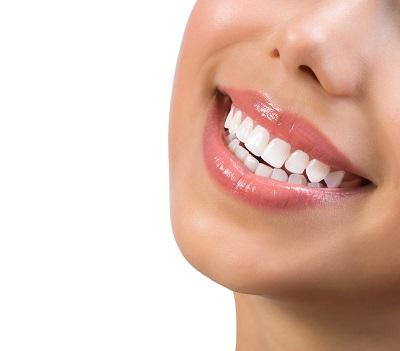 close up of woman's bright smile in mirrabooka