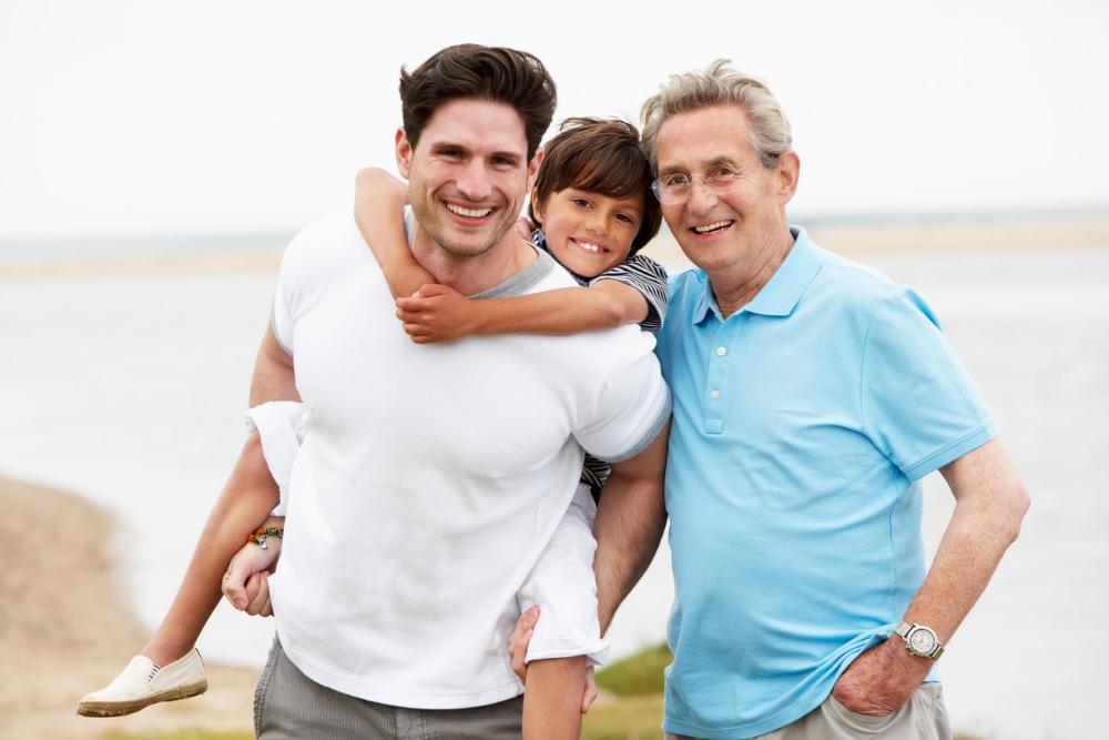 father, son, and grandfather smiling