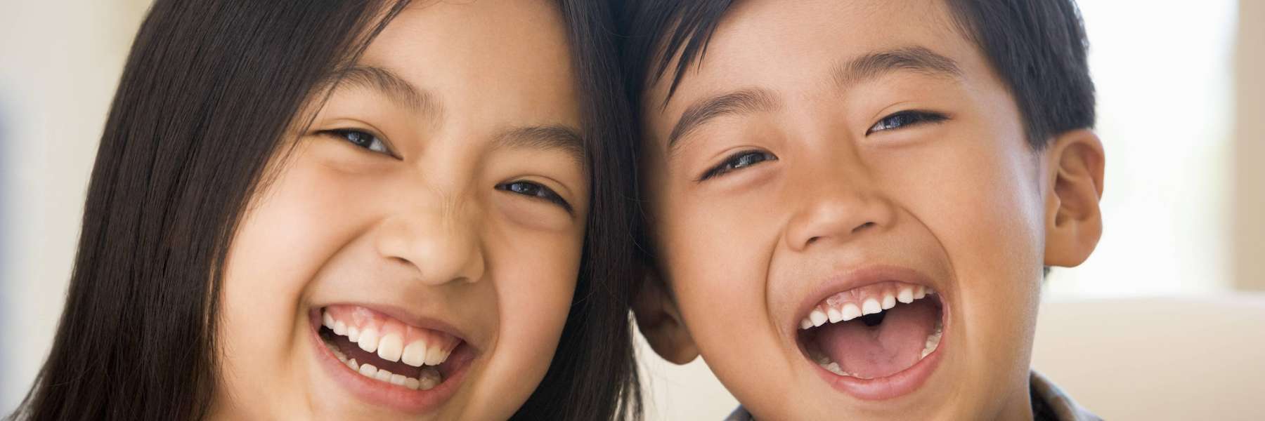 Young boy and girl smiling