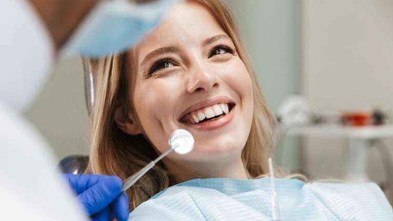 woman smiling in dental chair in mirrabooka