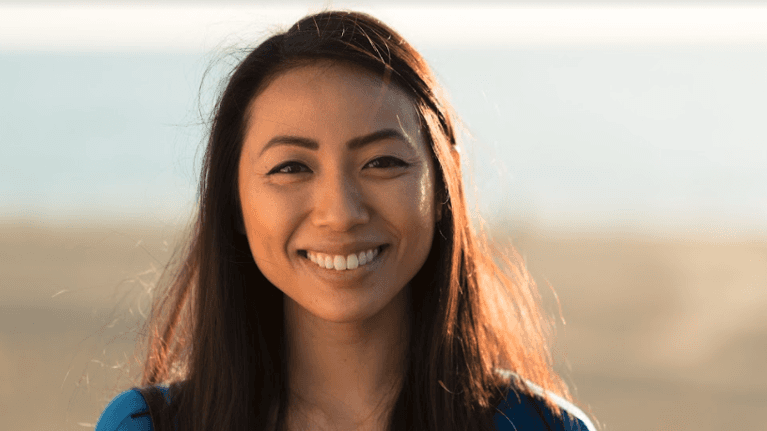 woman smiling after getting tooth-coloured fillings in mirrabooka