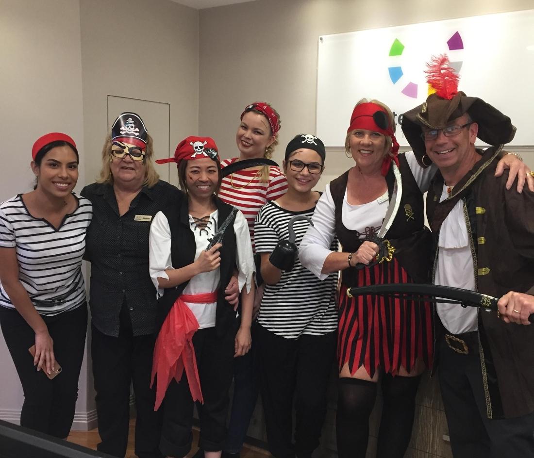 Dr Duke and staff celebrating Pirate Day